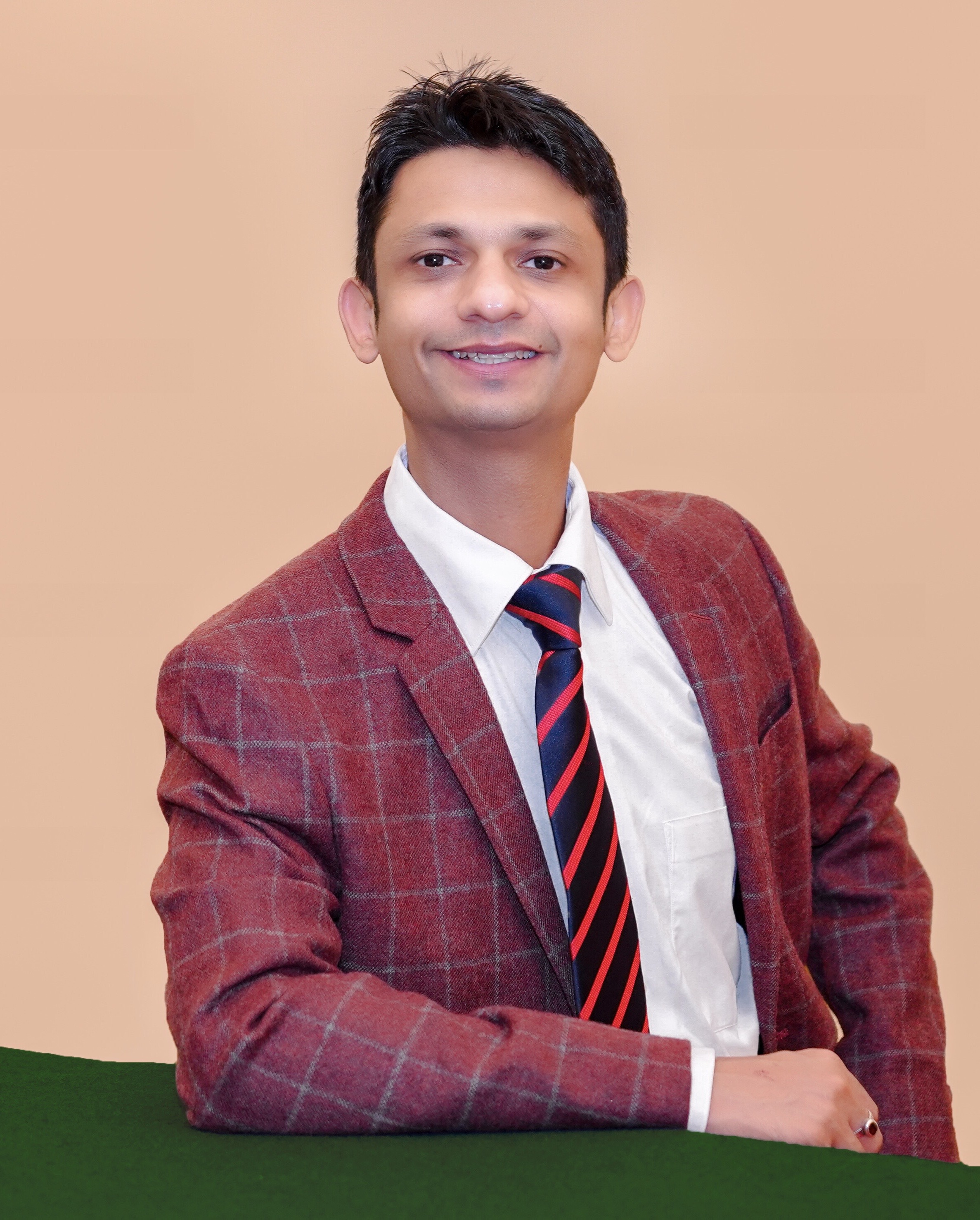 Manuj Mittal speaking on stage